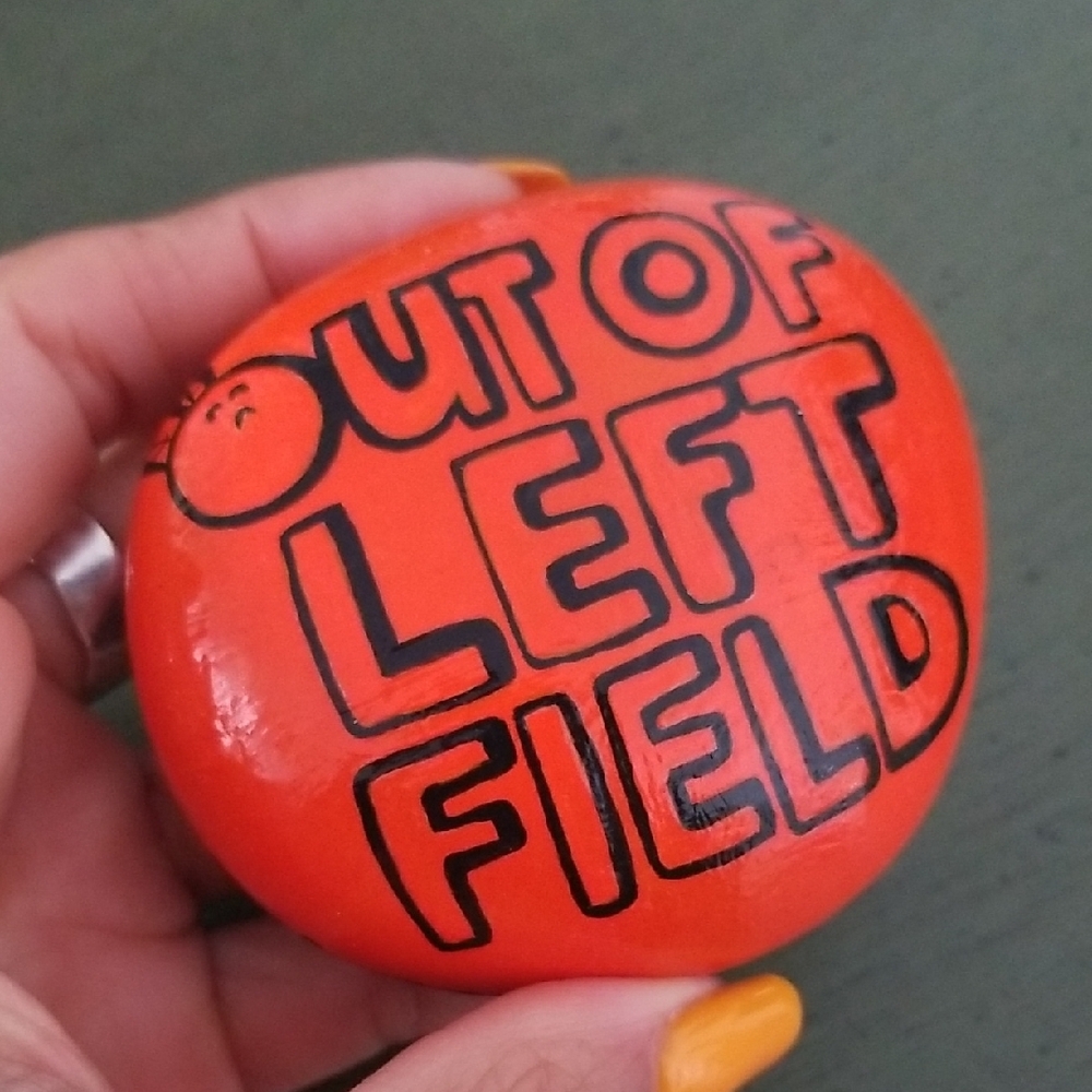 Orange Decorative Stone with Black Text